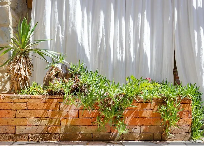 Апартаменты St Lucia Castle Банёл